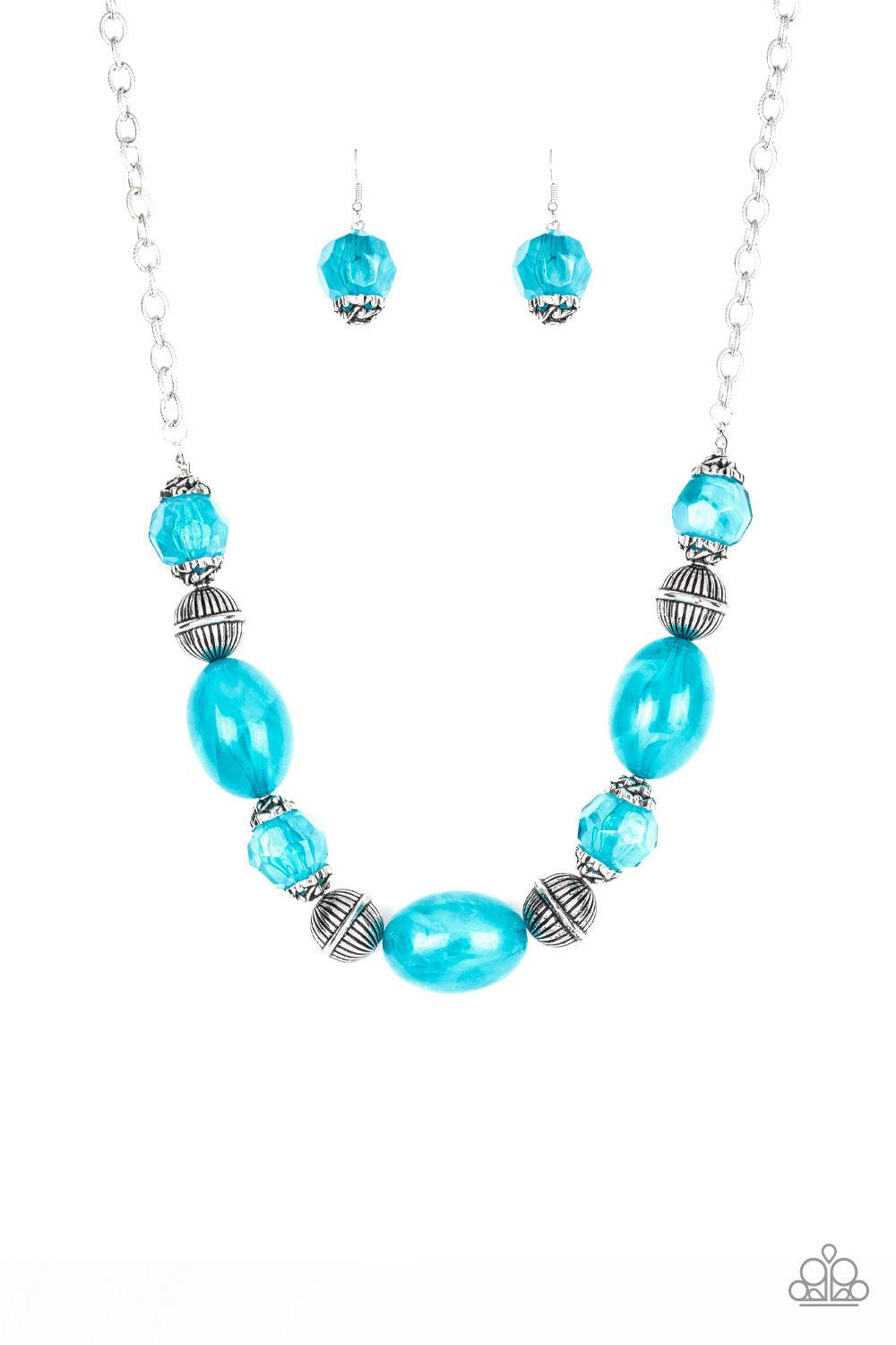 Paparazzi Accessories Ice Melt - Blue Featuring an array of antiqued silver beads, an icy collection of oversized glassy blue beads are threaded along an invisible wire below the collar for a colorful, statement making look. Features an adjustable clasp c