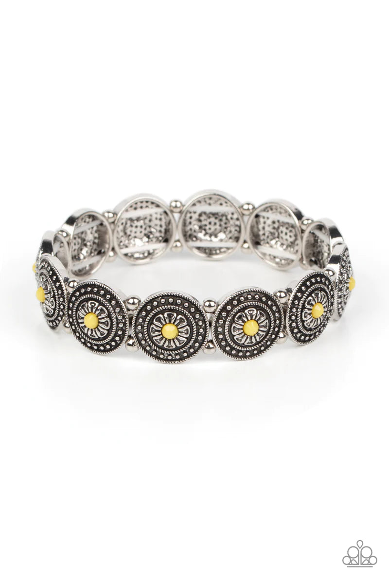 Paparazzi Accessories Granada Garden Party - Yellow Dotted with faceted Illuminating beaded centers, a studded collection of floral silver frames alternate with dainty silver beads along stretchy bands around the wrist for a whimsical pop of color. Sold a