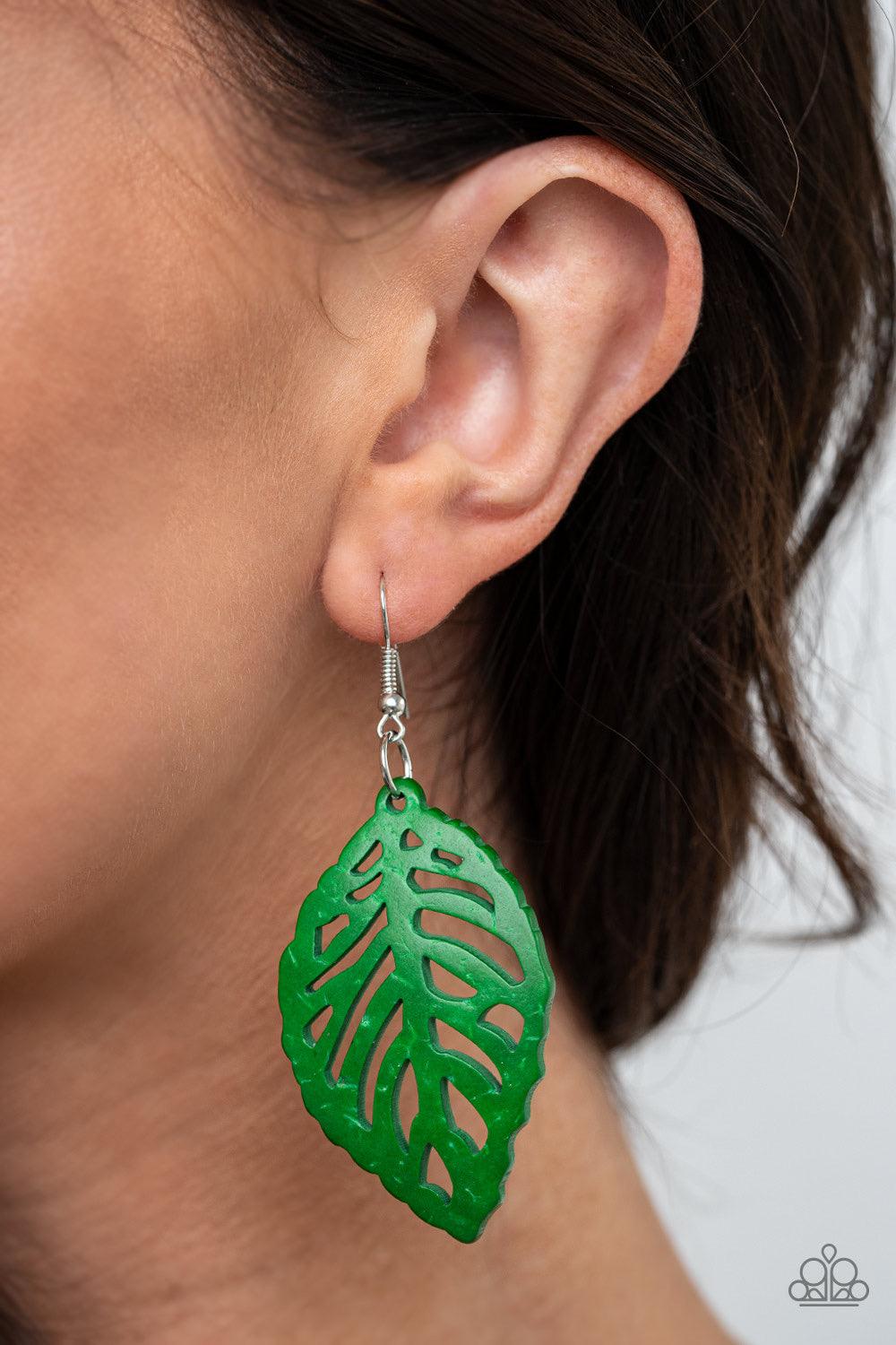 Paparazzi Accessories LEAF Em Hanging - Green Brushed in a distressed green finish, an airy wooden frame has been cut into a leafy stenciled design for a woodsy look. Earring attaches to a standard fishhook fitting. Sold as one pair of earrings. Jewelry
