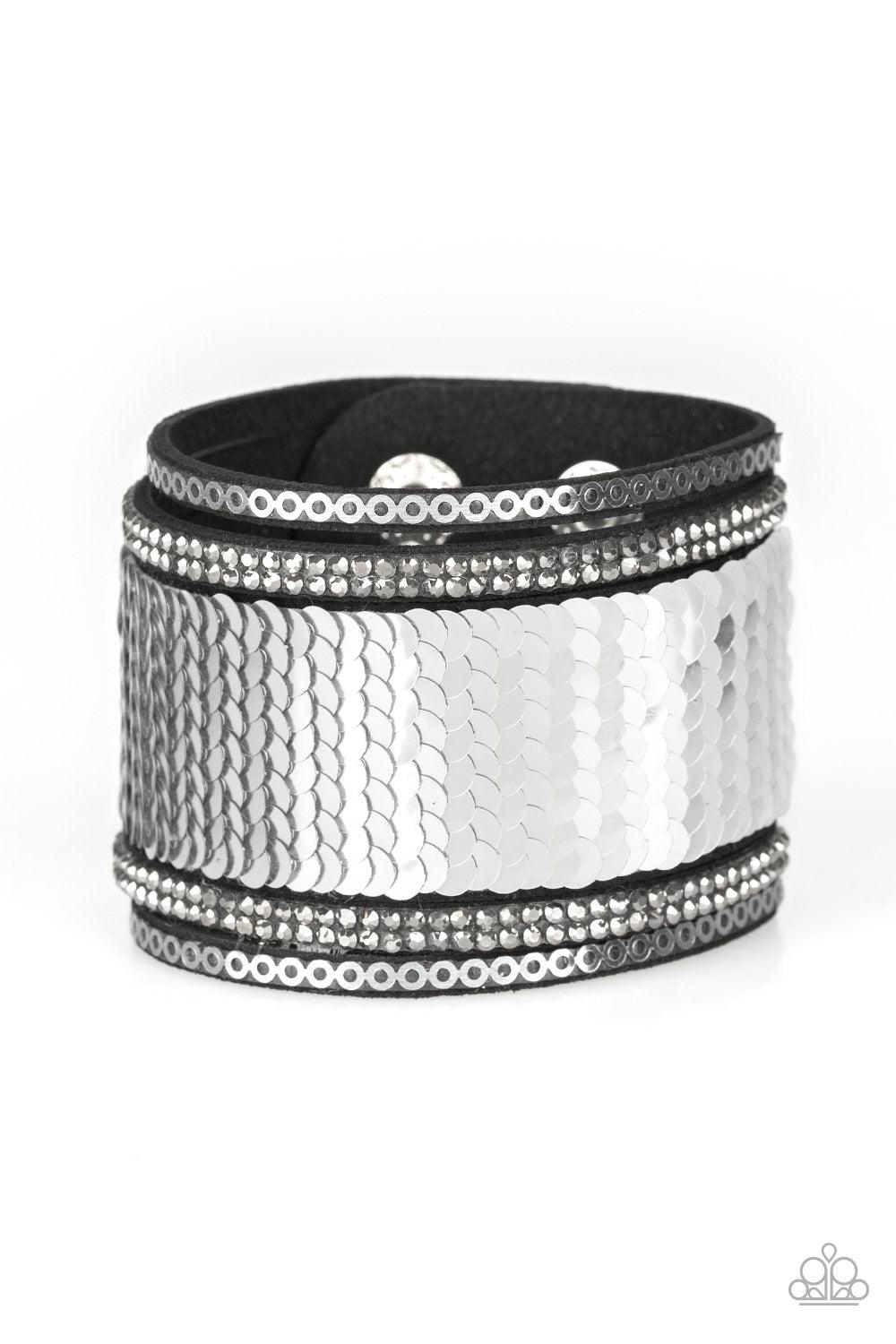 Paparazzi Accessories Heads Or Mermaid Tails - Silver nfused with strands of smoky hematite rhinestones and dainty metallic accents, row after row of shimmery sequins are stitched across the front of a spliced black suede band. Bracelet features reversibl