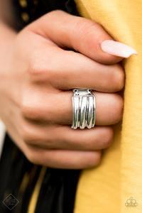 Paparazzi Accessories Rough Around The Edges - Silver Brushed in a high-sheen finish, ribbed silver bands stack across the finger for an edgy industrial look. Features a stretchy band for a flexible fit. Jewelry