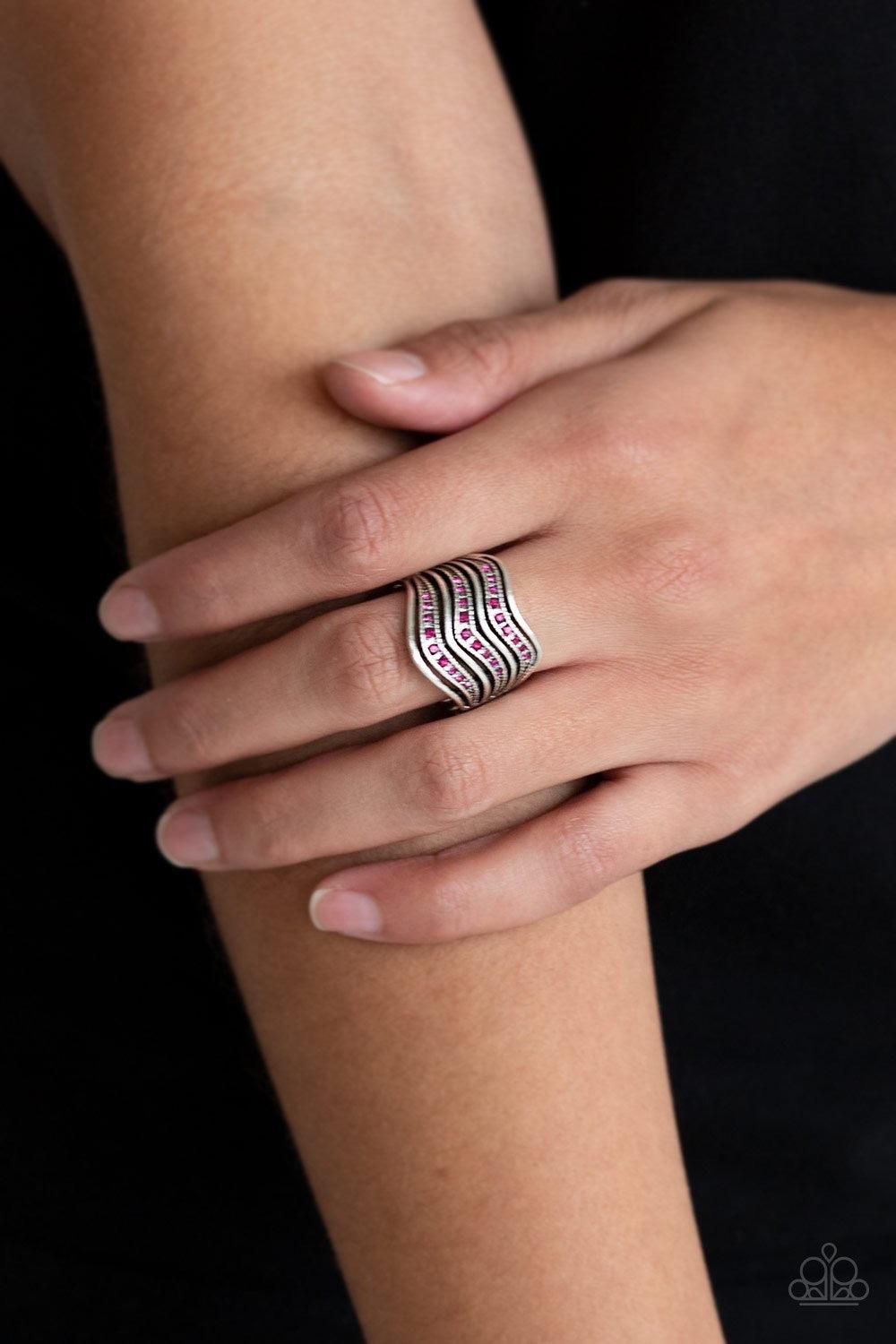 Paparazzi Accessories Fashion Finance - Pink Dotted in glittery pink rhinestones, studded silver bars and smooth silver bars wave across the finger into edgy stacks. Features a stretchy band for a flexible fit. Jewelry