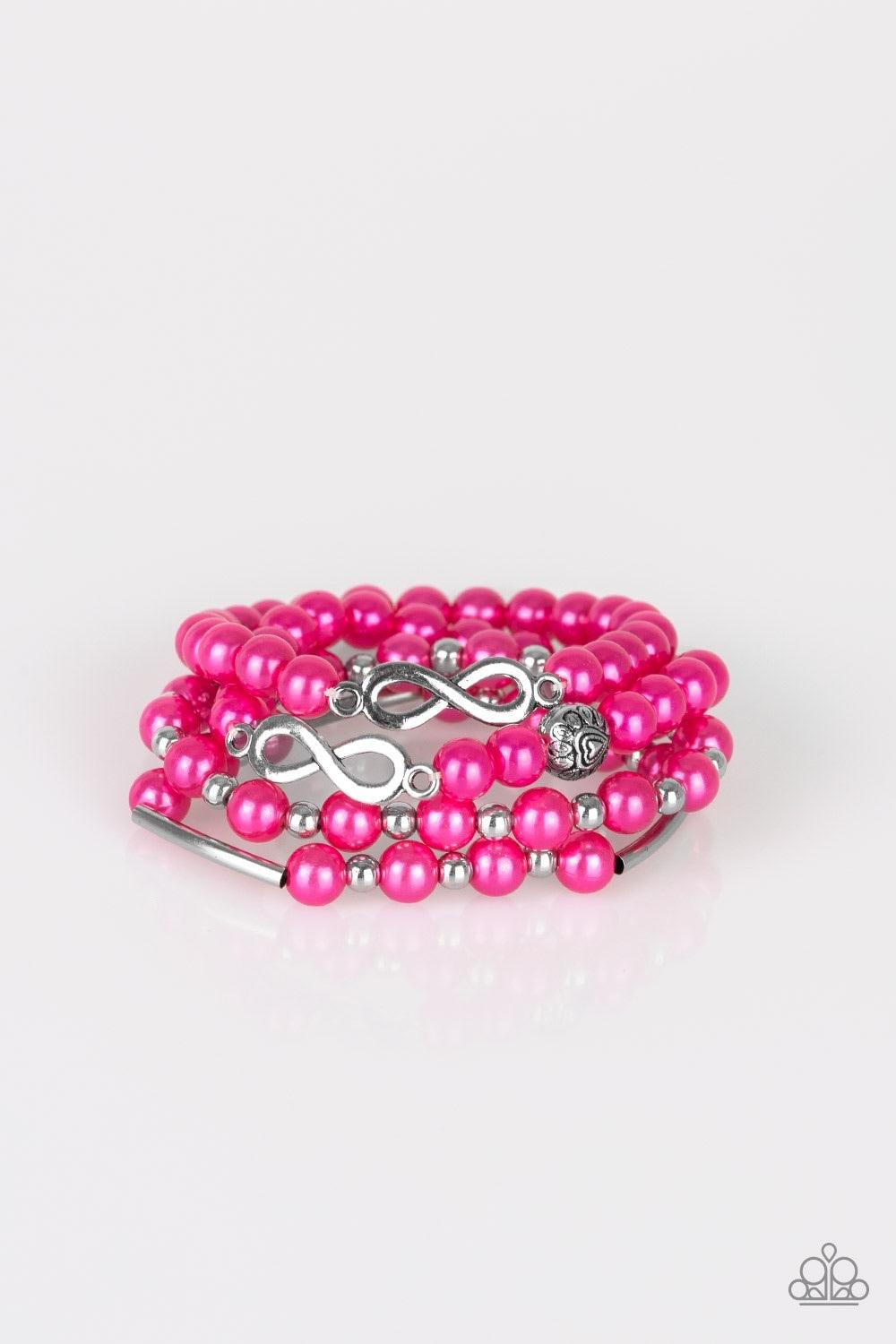 Paparazzi Accessories Limitless Luxury - Pink Infused with an array of silver accents, a collection of pink pearls and silver infinity charms are threaded along stretchy bands around the wrist for a glamorous look. Sold as one set of three bracelets. Jewe
