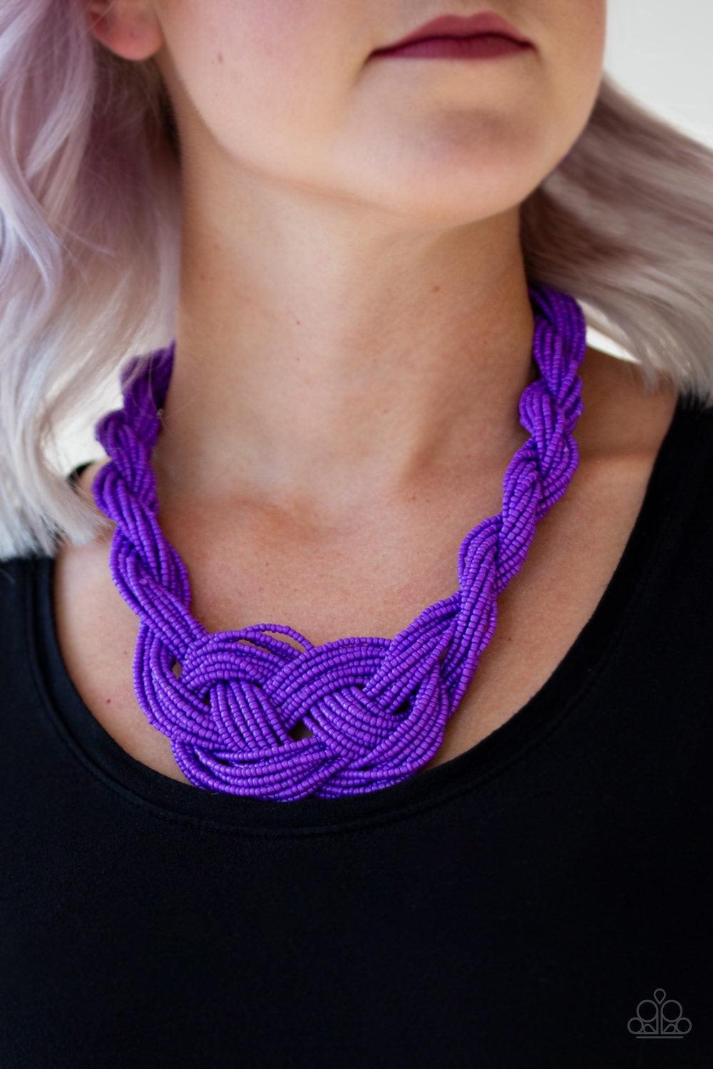 Paparazzi Accessories A Standing Ovation - Purple Countless strands of vivacious purple seed beads are twisted and knotted together to create an unforgettable statement piece. Features an adjustable clasp closure. Jewelry