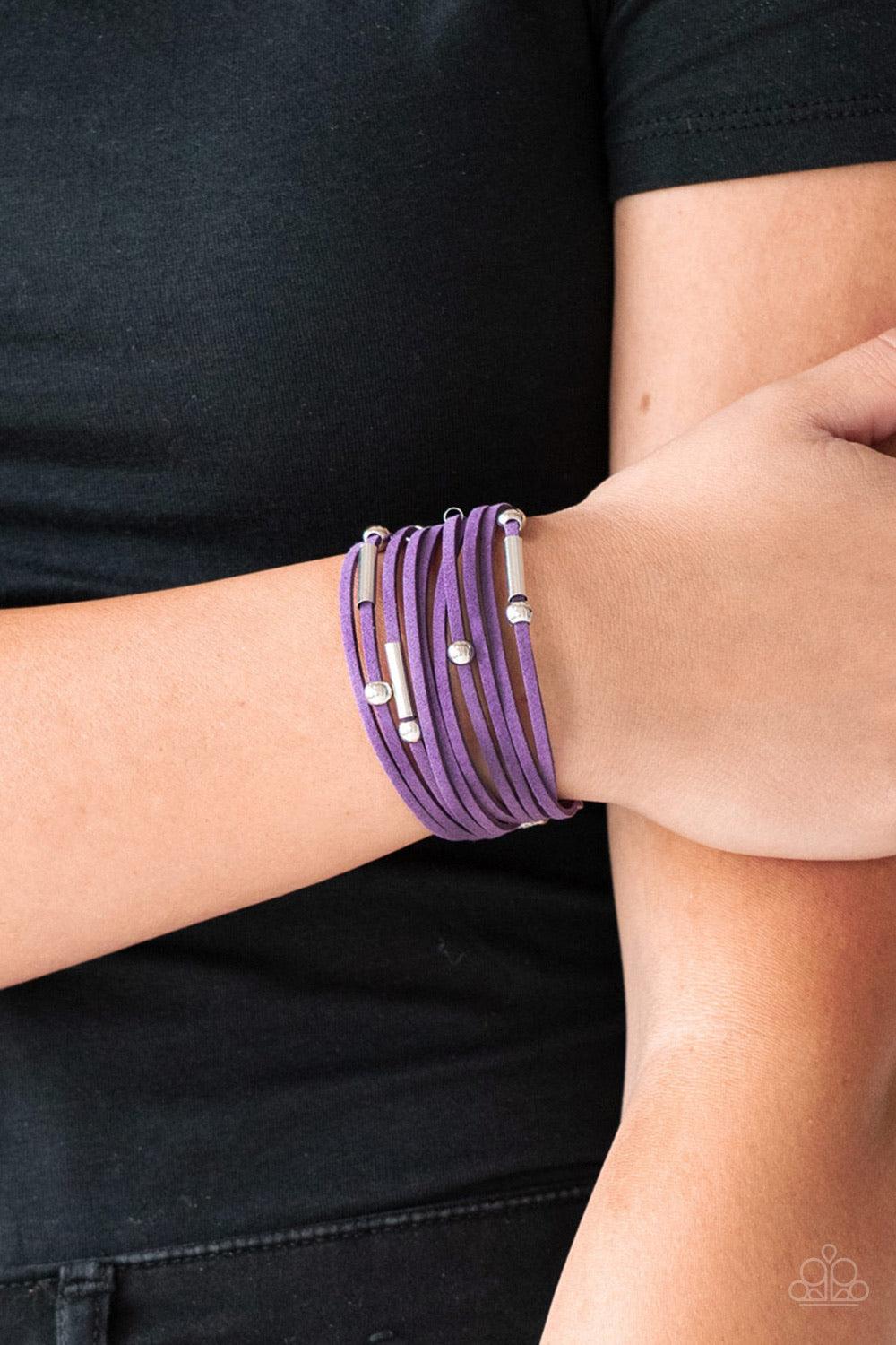Paparazzi Accessories Back to Backpacker - Purple Strung between two silver fittings, glistening silver and gunmetal accents slide along strands of purple suede for a seasonal look. Features an adjustable clasp closure. Jewelry