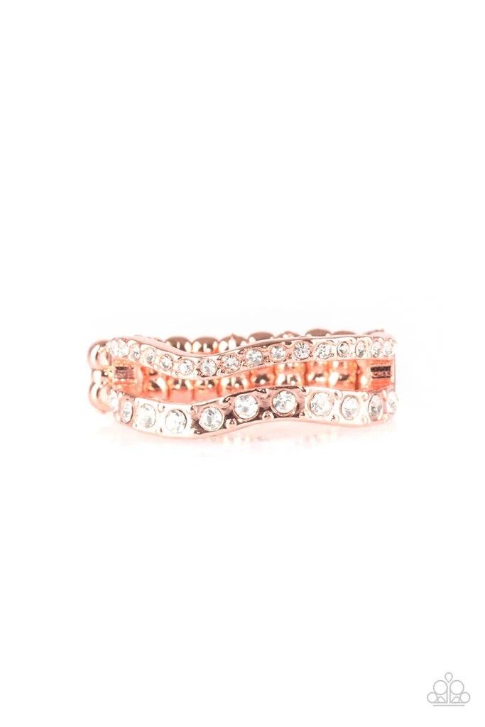 Paparazzi Accessories Elite Squad - Copper Varying in size, glittery white rhinestones are encrusted along waving shiny copper bands for a refined look. Features a dainty stretchy band for a flexible fit. Sold as one individual ring. Jewelry