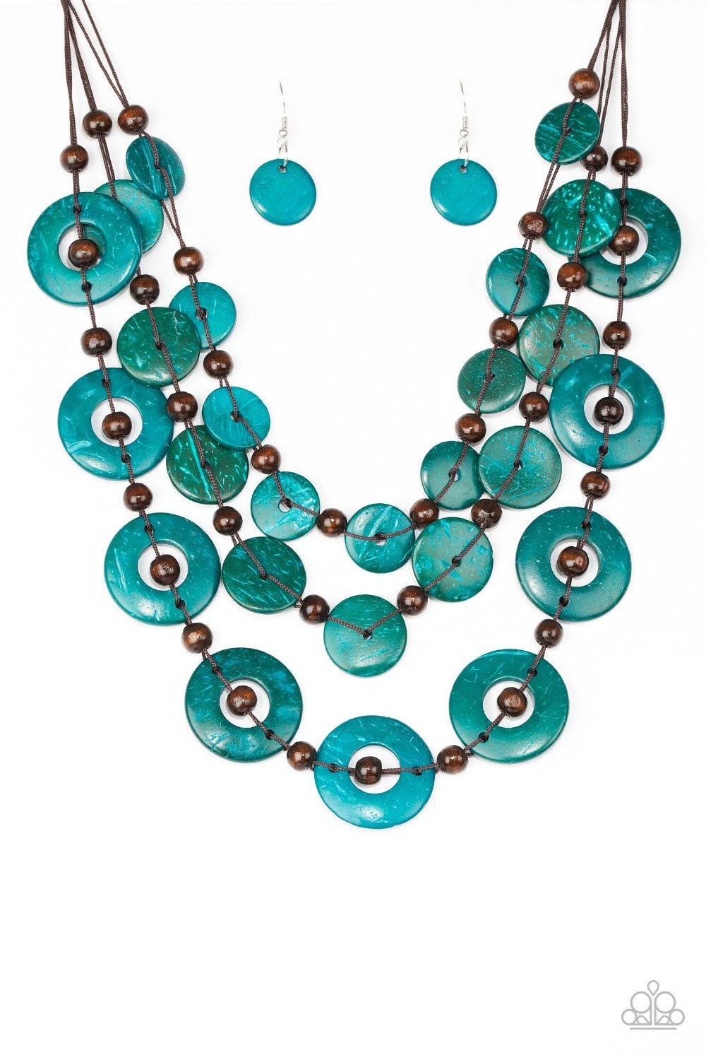 Paparazzi Accessories Catalina Coastin - Blue Brushed in a shell-like iridescence, refreshing blue wooden discs and round brown wooden beads are knotted along three strands of brown cording for a summery look. Features a button loop closure. Jewelry