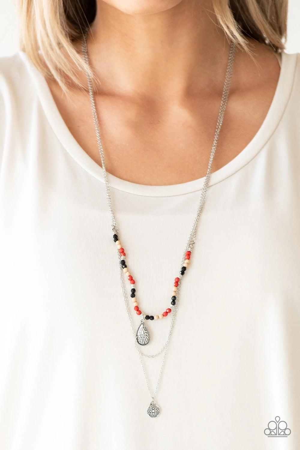 Paparazzi Accessories Mild Wild - Multi Infused with multicolored beading and an ornate silver teardrop pendant, a colorfully beaded strand gives way to a plain silver chain and a dainty silver chain featuring an antiqued pendant for a whimsically layered