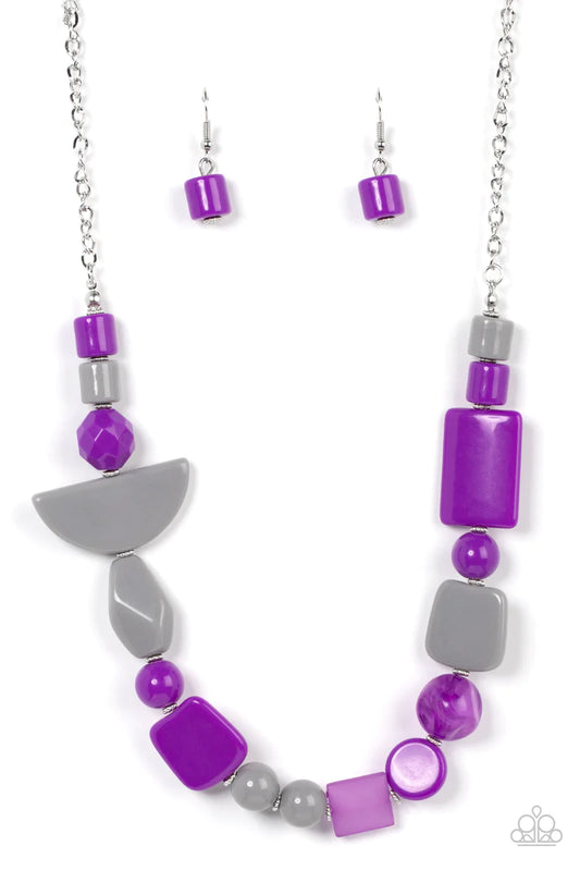 Paparazzi Accessories Tranquil Trendsetter - Purple Featuring the bold hues of Ultimate Gray and purple, mismatched acrylic and faux rock beads are haphazardly threaded along an invisible wire below the collar for an abstract artisan vibe. Features an adj