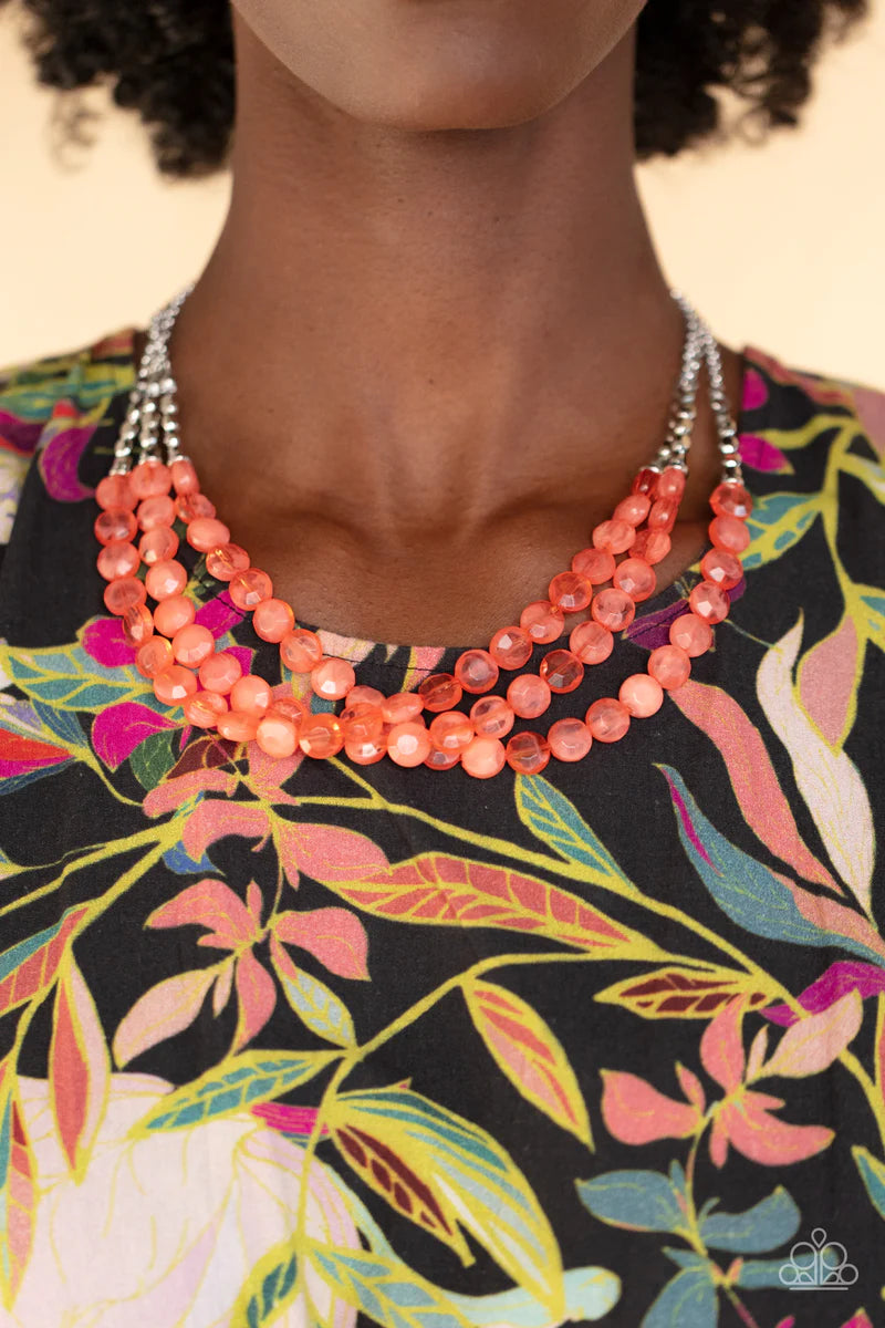 Paparazzi Accessories Pacific Picnic - Orange Threaded along invisible wires, rows of faceted silver beads give way to opaque coral gem-like beads below the collar for a summery splash of color. Features an adjustable clasp closure. Sold as one individual