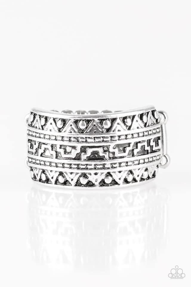 Paparazzi Accessories Textile Triumph - Silver Brushed in an antiqued shimmer, a glistening silver band is embossed in stunning textile patterns for a seasonal look. Features a stretchy band for a flexible fit. Sold as one individual ring. Jewelry