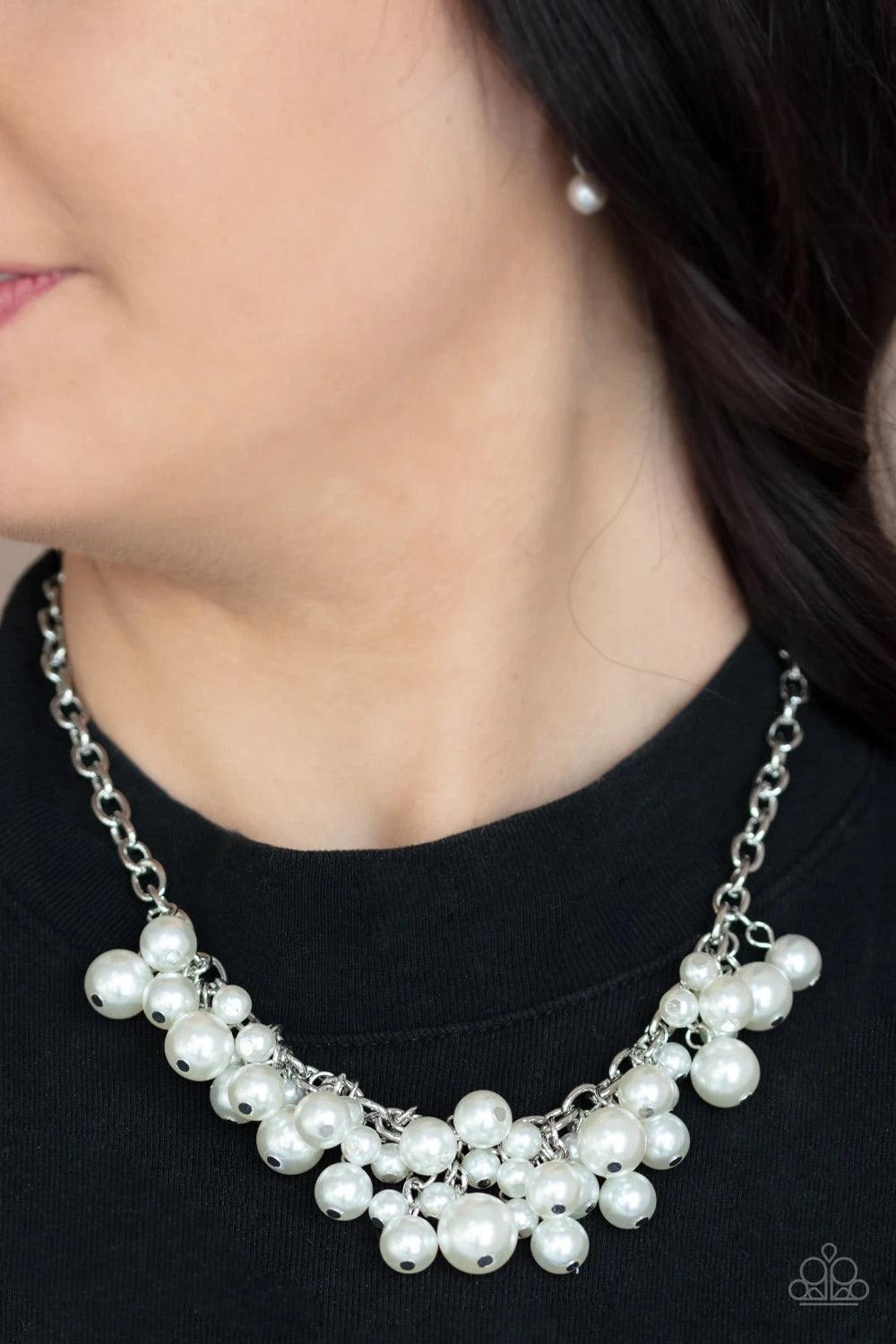 Paparazzi Accessories Down For The COUNTESS - White A bubbly collection of classic and oversized white pearls swing from the bottom of a bold silver chain, creating a dramatic fringe below the collar. Features an adjustable clasp closure. Sold as one indi