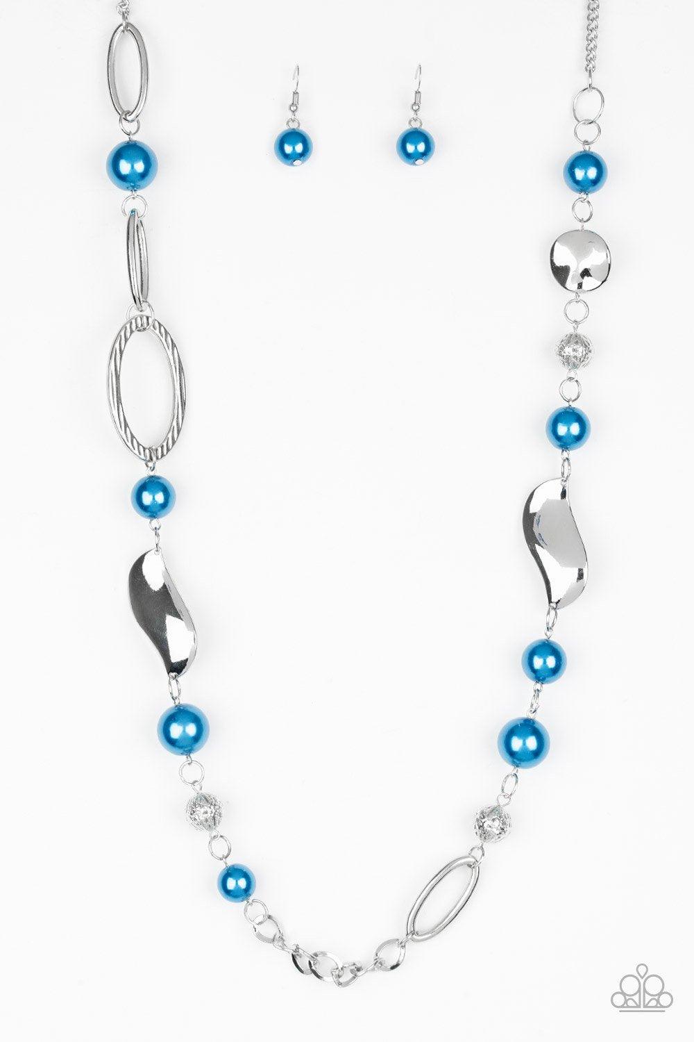 Paparazzi Accessories All About Me - Blue Oversized blue pearls, ornate silver beads, and an array of glistening silver accents trickle along a lengthened silver chain for a refined look. Features an adjustable clasp closure. Jewelry