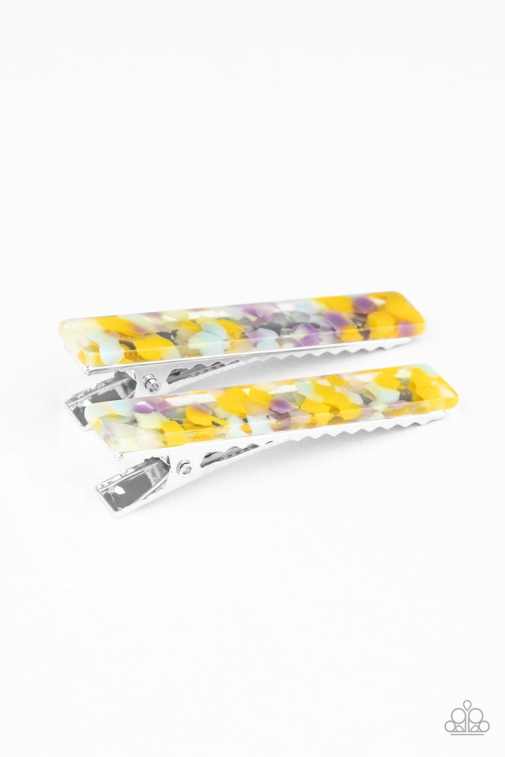 Paparazzi Accessories Get Outta HAIR! - Multi Speckled in smudges of yellow, green, blue, and purple dots, a pair of clear acrylic frames pins back the hair for a colorfully retro look. Features standard hair clips on the back. Color may vary. Hair Access