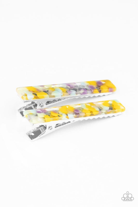 Paparazzi Accessories Get Outta HAIR! - Multi Speckled in smudges of yellow, green, blue, and purple dots, a pair of clear acrylic frames pins back the hair for a colorfully retro look. Features standard hair clips on the back. Color may vary. Hair Access