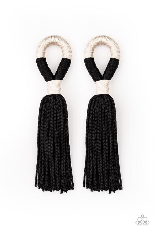 Paparazzi Accessories Moroccan Mambo - Black Shiny off-white and black cording knots around a round fitting as a plume of soft black cording free-falls from the bottom, creating a trendy tassel. Earring attaches to a standard post fitting. Sold as one pai