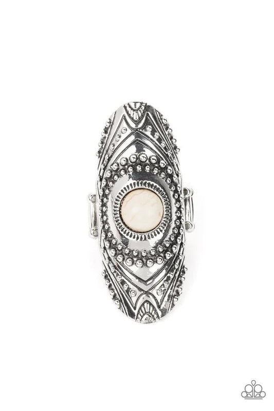Paparazzi Accessories Rural Residence - White An earthy white stone creates a colorful centerpiece for an oversized elongated silver frame. Embellished with studded texture and geometric designs, the patterned frame results in a hypnotizing lure atop the