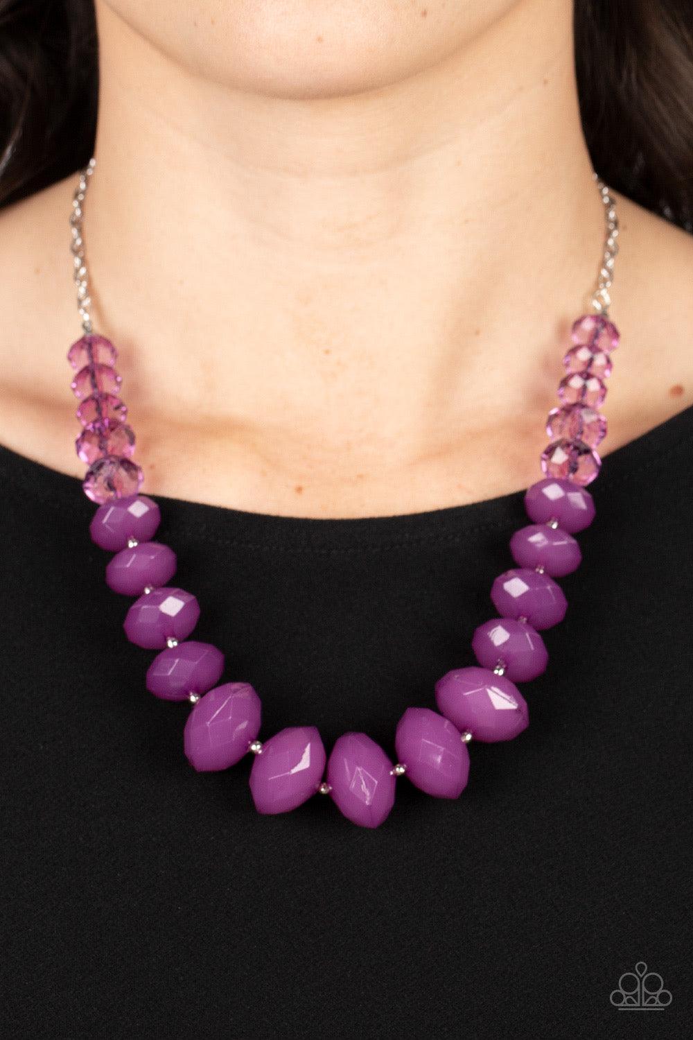 Paparazzi Accessories Happy-GLOW-Lucky - Purple Separated by dainty silver beads, glassy Poinciana crystal-like beads gradually morph into opaque Poinciana crystal-like beads below the collar. The vibrant compilation grows in size and intensity further be