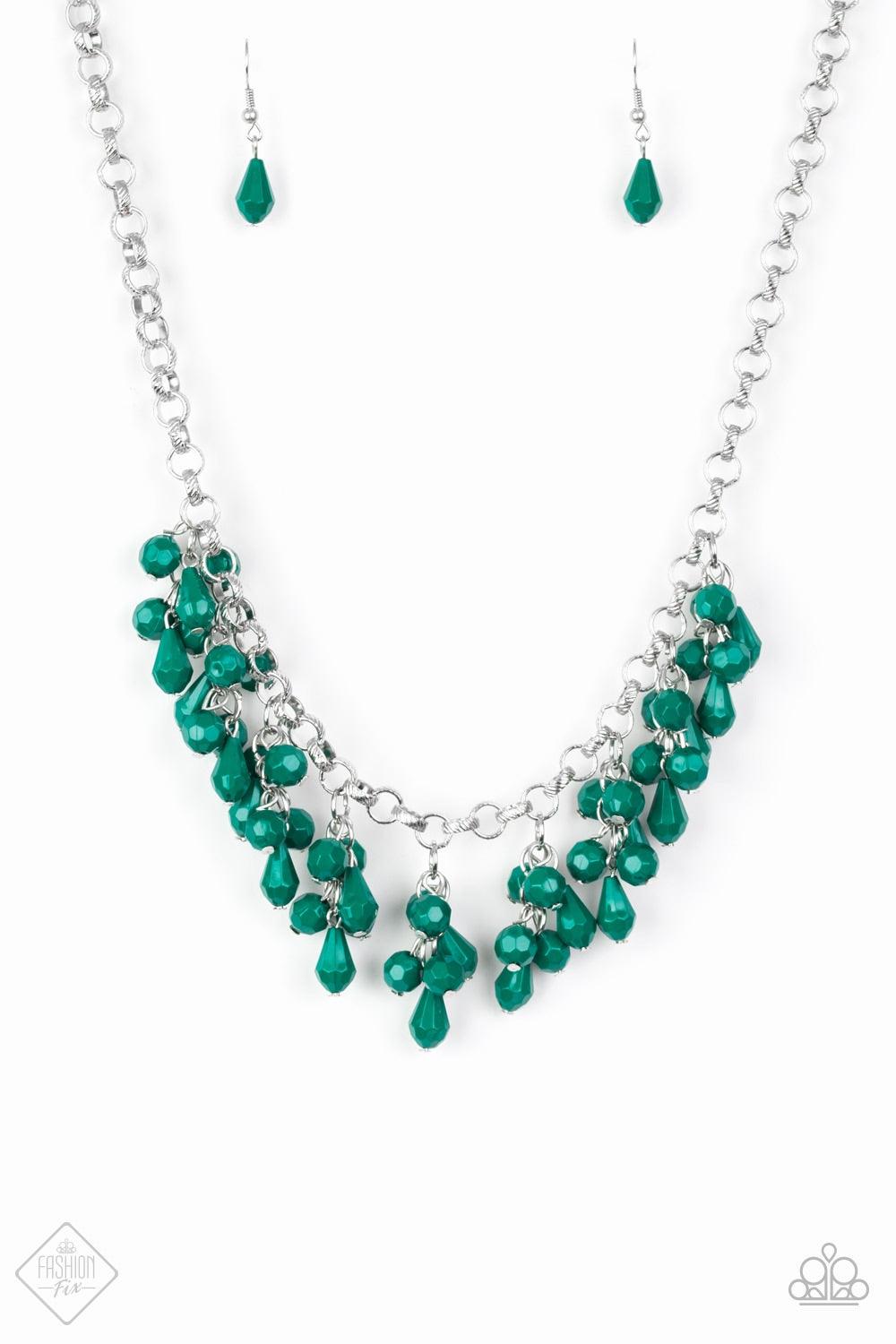 Paparazzi Accessories Modern Macarena - Green Featuring round and teardrop shapes, clusters of faceted Quetzal Green beads swing from the bottom of a shimmery silver chain, creating a playful fringe below the collar. Features an adjustable clasp closure.