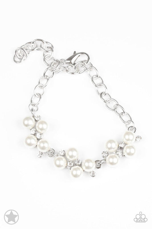 Paparazzi Accessories I Do - White Small clusters of shimmery white pearls are dusted with sparkling rhinestones, creating a romantic timeless design. Features an adjustable clasp closure. Jewelry