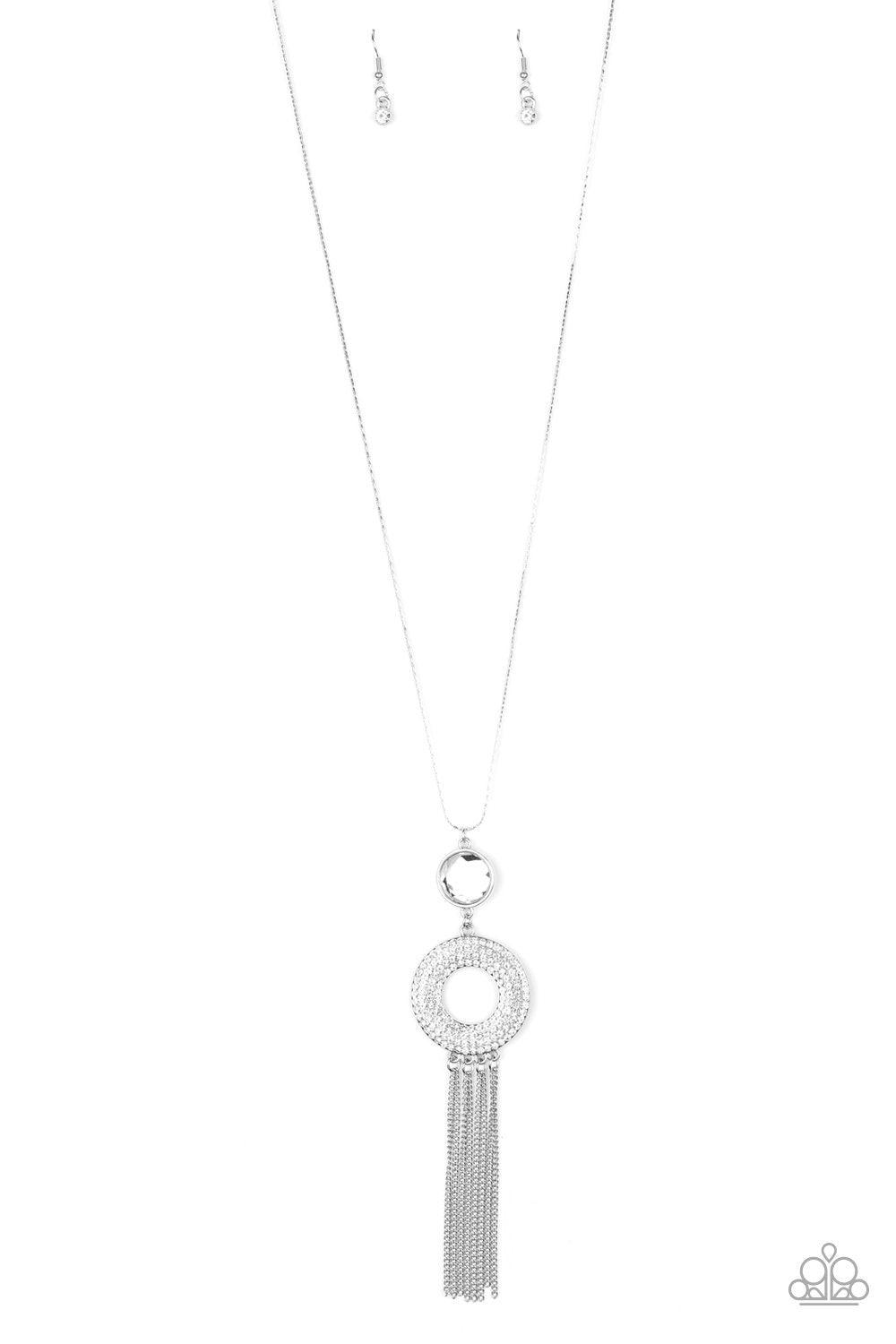 Paparazzi Accessories Sassy As They Come - White A large rounded rhinestone dangles above a glistening white rhinestone encrusted ring which swings from the bottom of a lengthened silver chain, creating a glamorous pendant. Rounded silver snake chains str