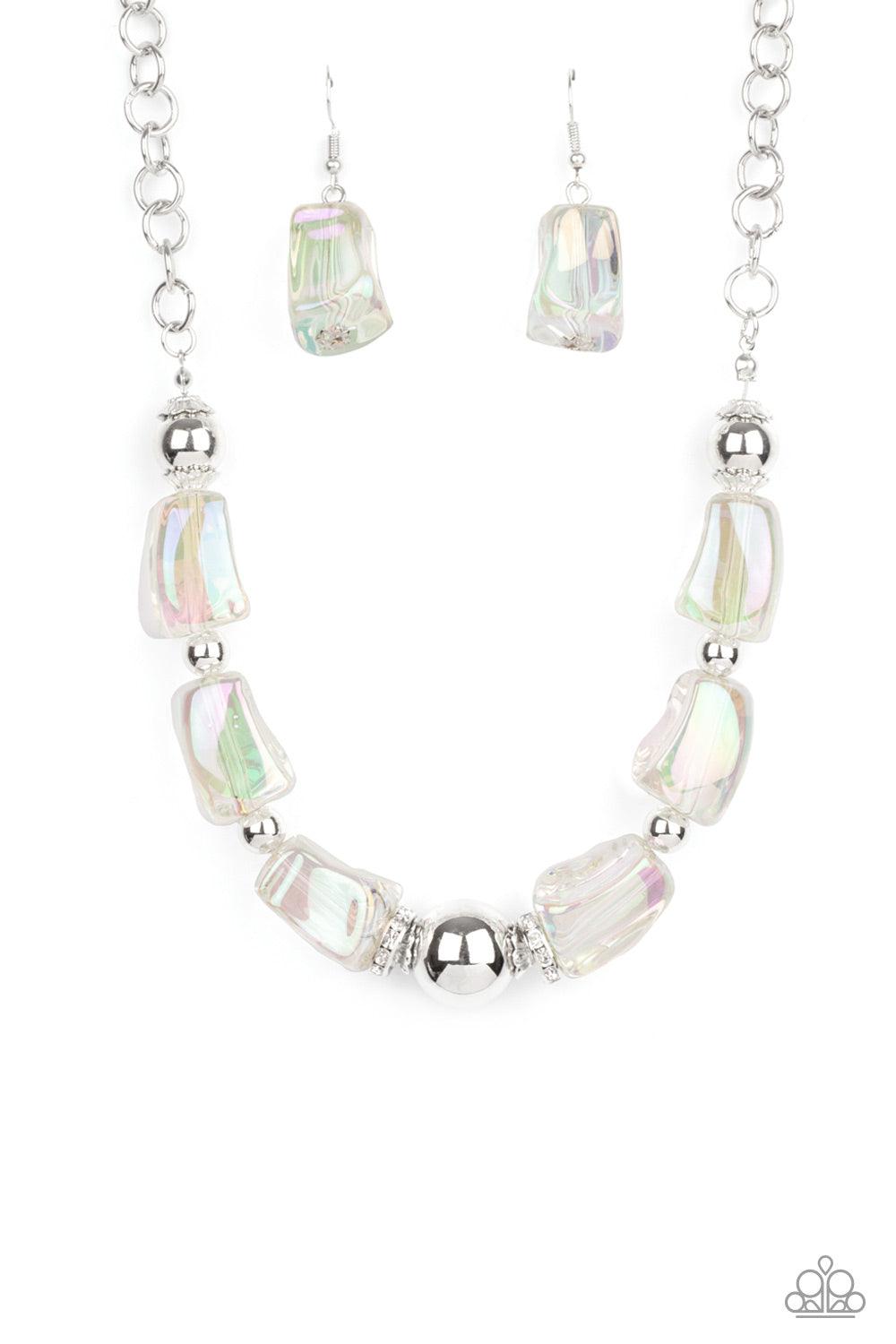 Paparazzi Accessories Iridescently Ice Queen - Multi Featuring an icy iridescence, glassy asymmetrical beads joins a mismatched collection of silver beads, white rhinestone encrusted rings, and scalloped silver accents below the collar. Attached to a silv