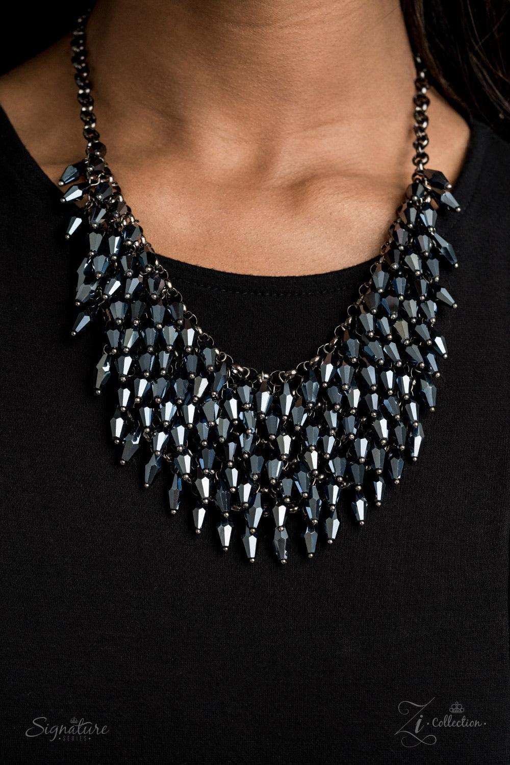 Paparazzi Accessories The Heather 💗💗ZiCollection $25💗💗 Row after row of metallic blue beads swing from an edgy net of glistening gunmetal links, layering into an edgy fringe below the collar. Featuring flashy faceted edges, the mesmerizing beads spark