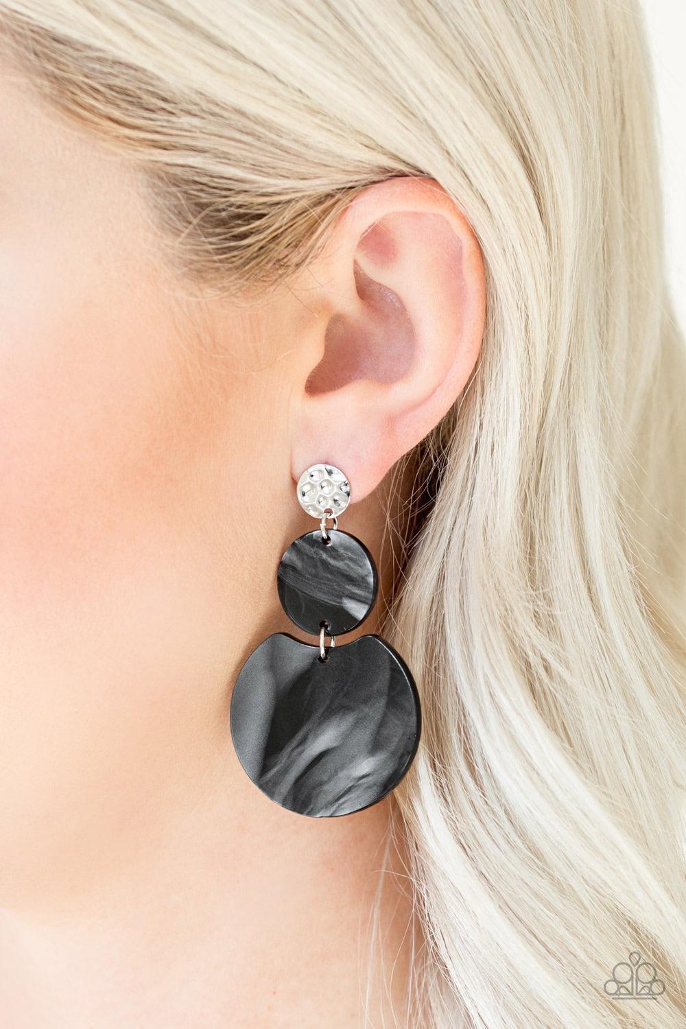 Paparazzi Accessories Miami Mariner - Black Brushed in a shell-like iridescence, shiny black frames trickle from a hammered silver frame for a retro look. Earring attaches to a standard post fitting. Jewelry