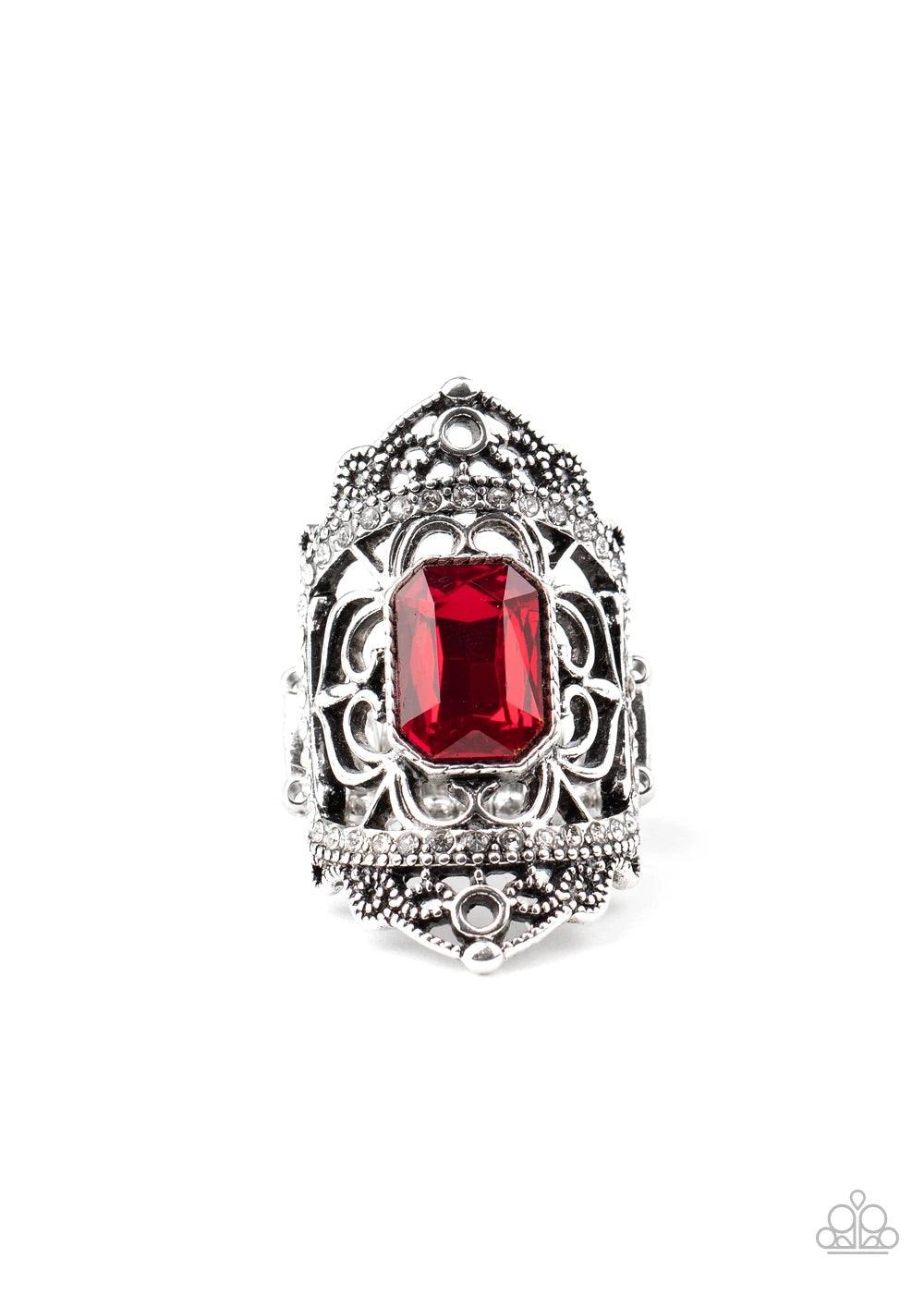 Paparazzi Accessories Undefinable Dazzle - Red Infused with two bands of glittery white rhinestones, smooth and studded silver filigree branches out into a regal backdrop across the finger. Featuring an emerald style cut, a stunning red rhinestone embelli