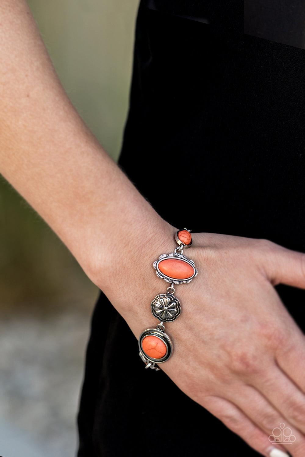 Paparazzi Accessories Gorgeously Groundskeeper - Orange a collection of antiqued silver frames link with a decorative floral charm around the wrist for a seasonal flair. Features an adjustable clasp closure. Jewelry