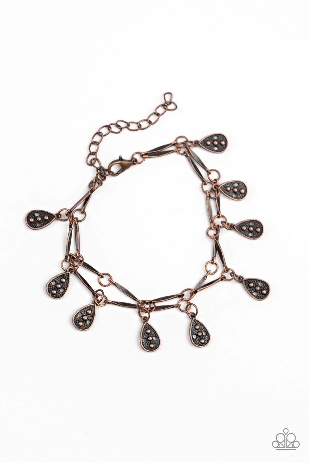 Paparazzi Accessories Gypsy Glee - Copper Glistening copper rods and ornate teardrops link around the wrist in two rows, creating a playful fringe. Features an adjustable clasp closure. Sold as one individual bracelet. Jewelry