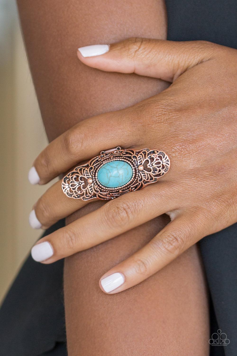 Paparazzi Accessories Ego Trippin’ - Copper Dotted with a refreshing turquoise stone center, glistening copper filigree climbs the finger, coalescing into a dramatic frame. Features a stretchy band for a flexible fit. Sold as one individual ring. Jewelry