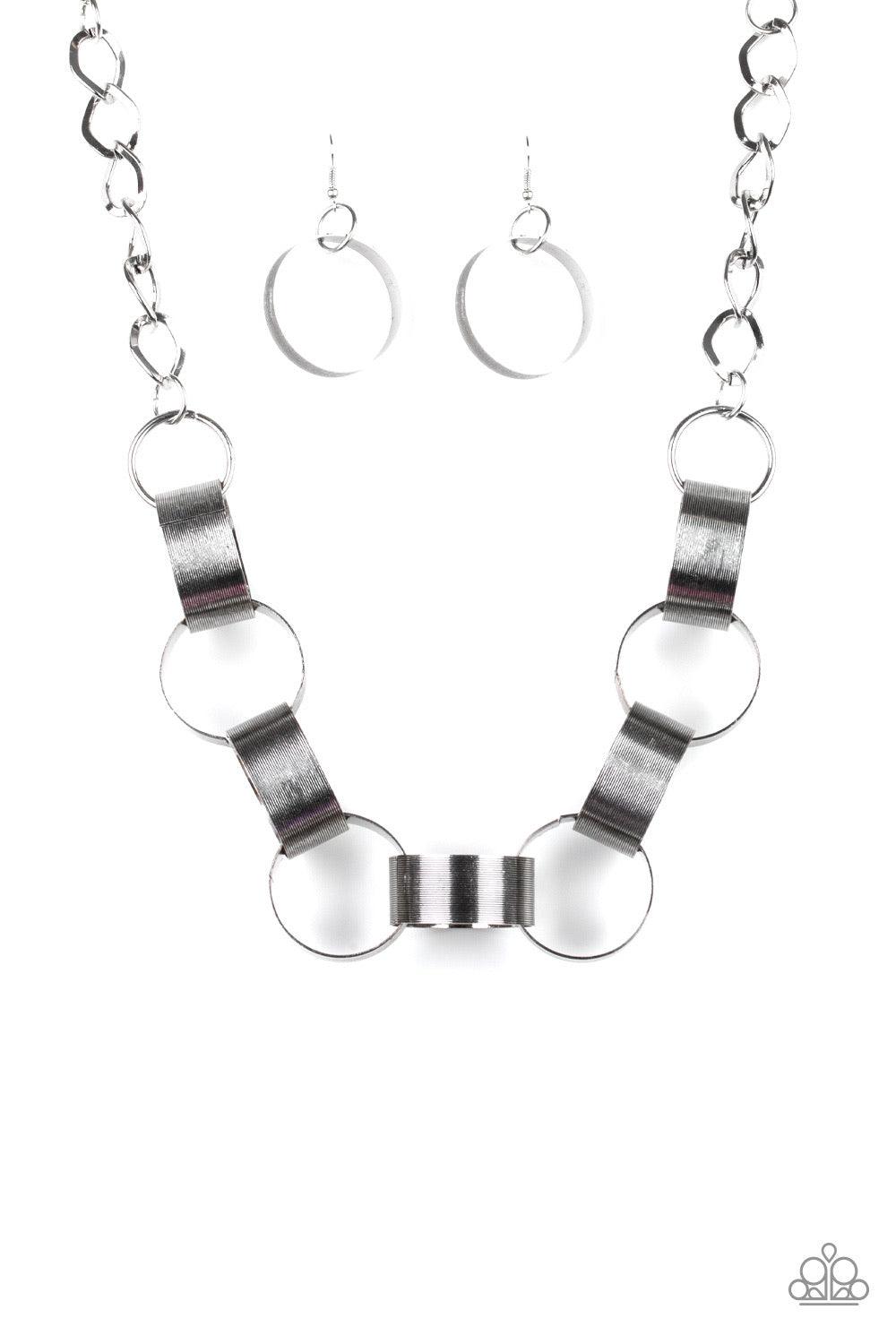 Paparazzi Accessories Big Hit - Silver Etched in linear patterns, dramatically oversized silver links connect below the collar for a bold statement-making look. Features an adjustable clasp closure. Jewelry