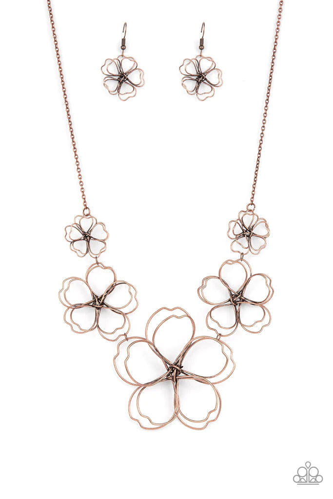 Paparazzi Accessories The Show Must GROW On - Copper Rustic copper wire delicately twists into oversized blossoms. Gradually increasing in size, the 3D frames elegantly pop beneath the collar. Features an adjustable clasp closure. Sold as one individual n