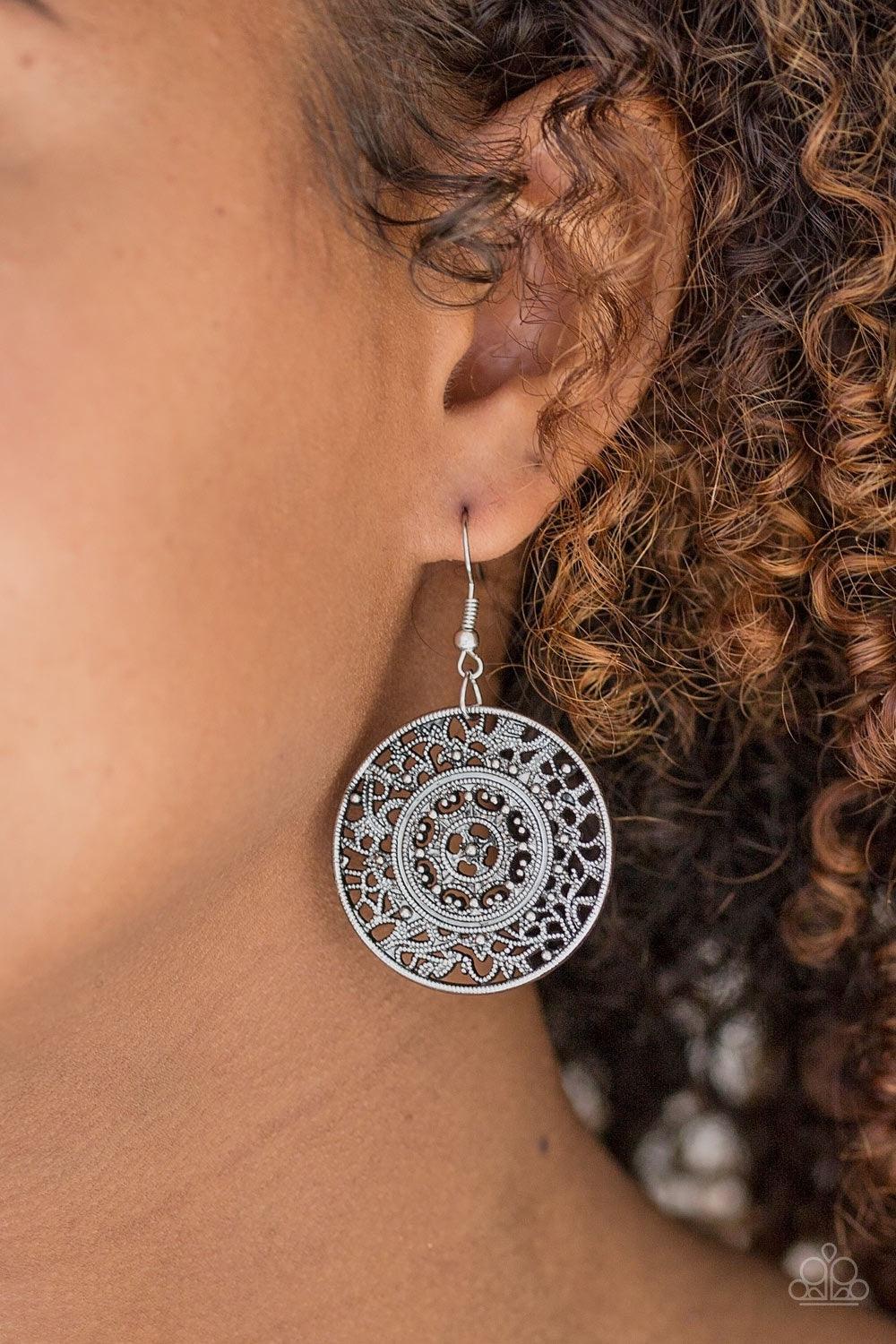 Paparazzi Accessories Say You WHEEL - Silver Brushed in an antiqued shimmer, dotted vine-like filigree swirls around a round frame for a tribal inspired look. Earring attaches to a standard fishhook fitting. Jewelry