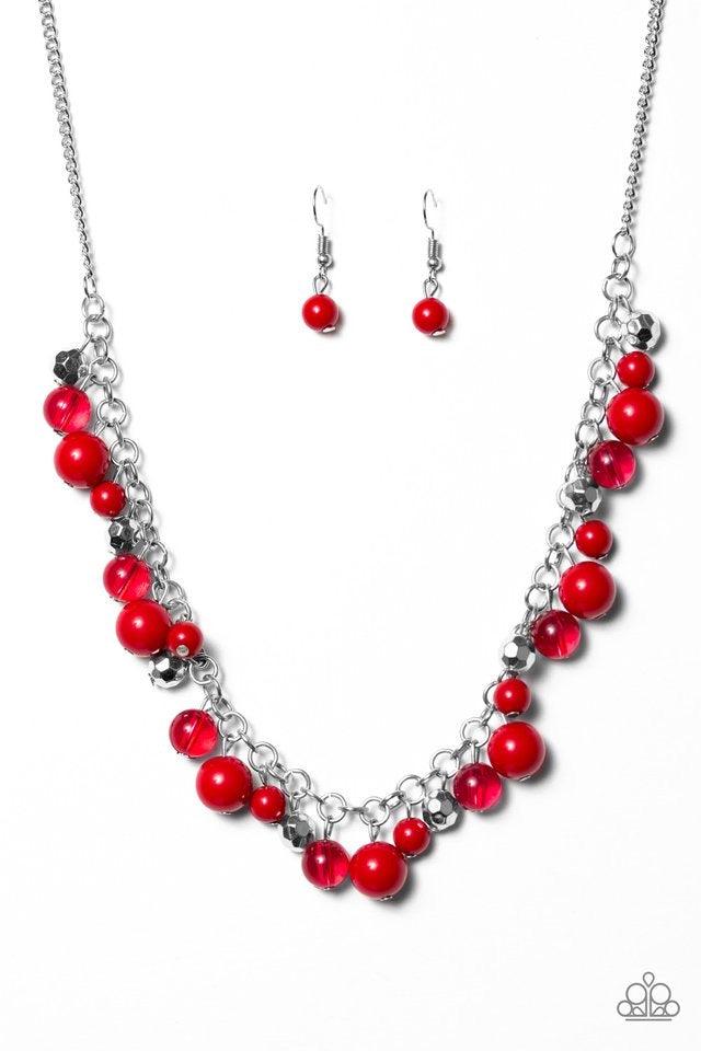Paparazzi Accessories Wander With Wonder - Red Polished and opaque red beading trickle from a shimmery silver chain, creating a colorful fringe below the collar. Faceted silver beads are sprinkled between the colorful accents for a whimsical finish. Featu