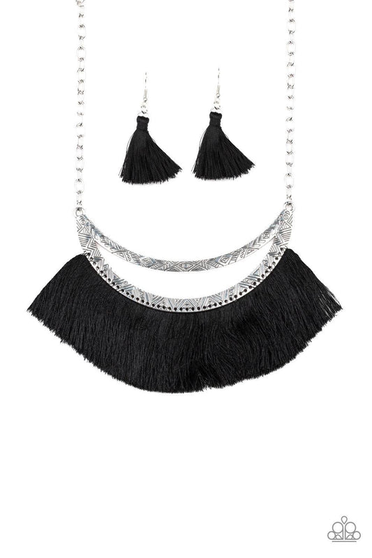 Paparazzi Accessories The MANE Event - Black A plume of shiny black thread flares out from the bottom of an airy half-moon frame stamped in tribal inspired patterns, creating a bold fringe below the collar. Features an adjustable clasp closure. Jewelry