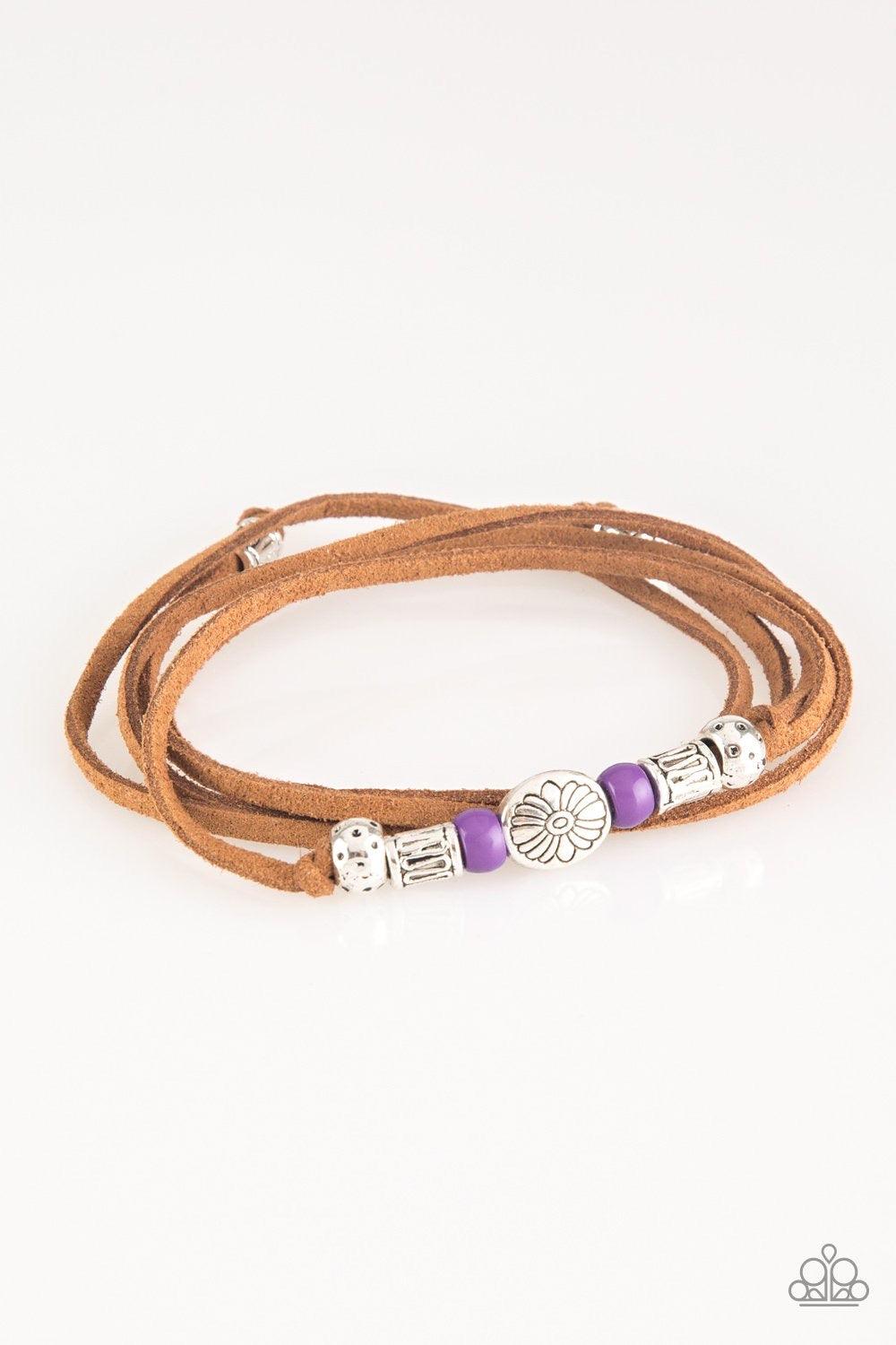 Paparazzi Accessories Clear A Path - Purple An array of purple and silver beads are knotted in place along elongated suede cording for a wanderlust fashion. To secure bracelet, tie ends in place around the wrist at desired length. Sold as one individual b