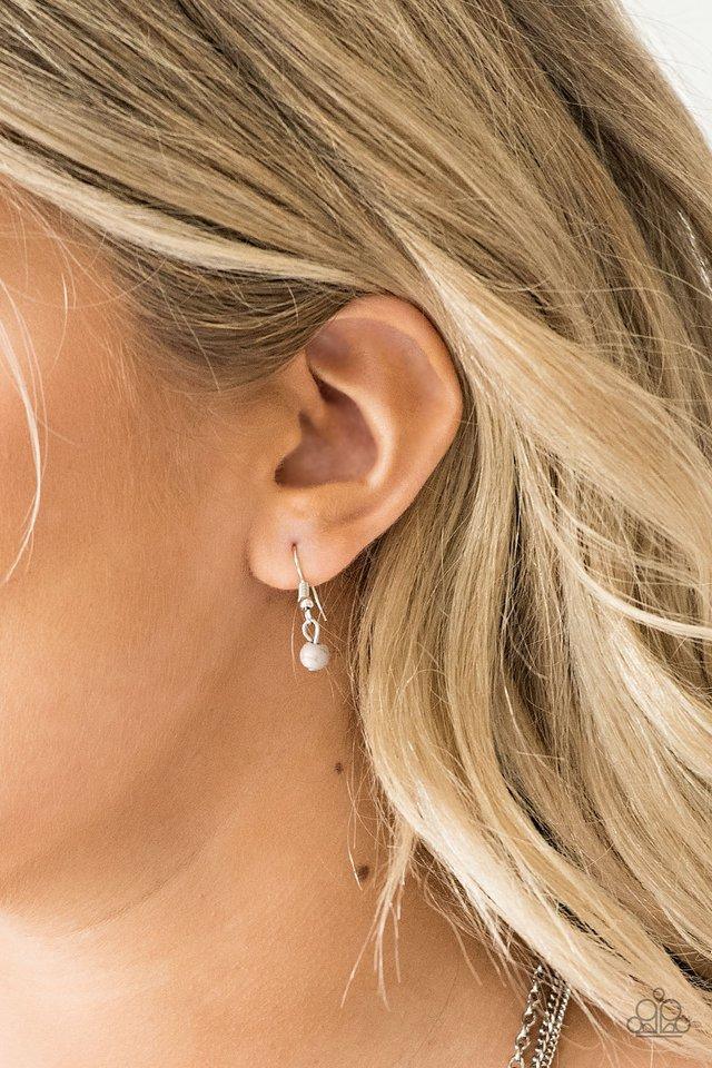 Paparazzi Accessories Laying The Groundwork - Silver Infused with a plain silver chain, mismatched gray stone beads sporadically trickle along shimmery silver chains, creating earthy layers down the chest. Features an adjustable clasp closure. Sold as one