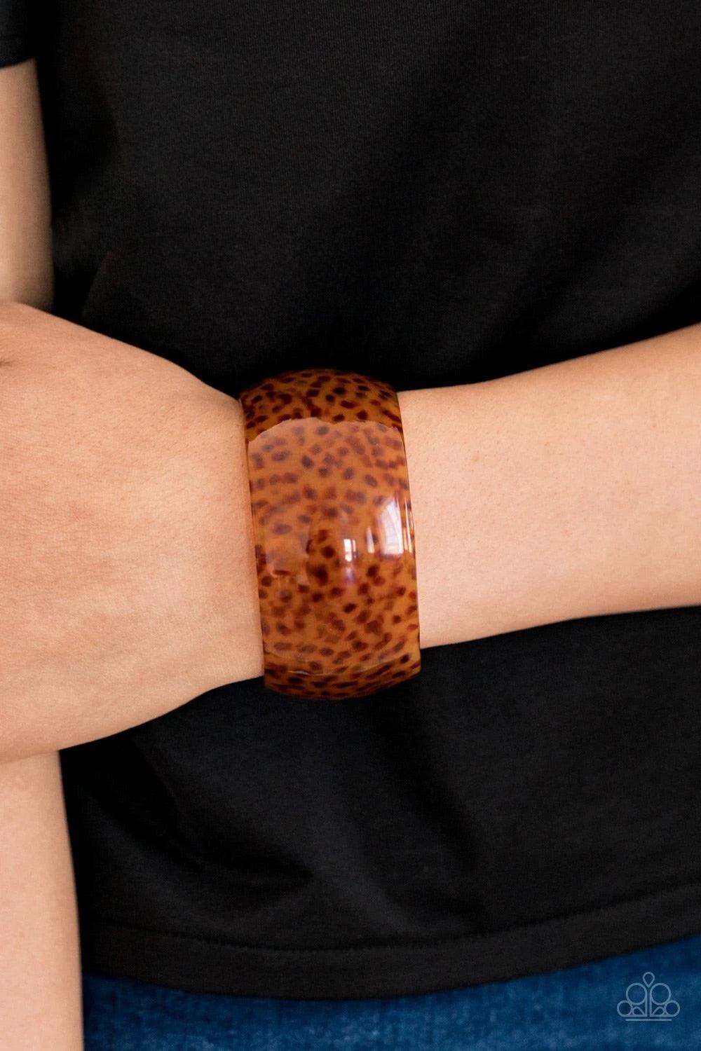 Paparazzi Accessories Jungle Cruise - Brown A thick brown acrylic cuff curls around the wrist for a wildly retro fashion. Sold as one individual bracelet. Bracelets