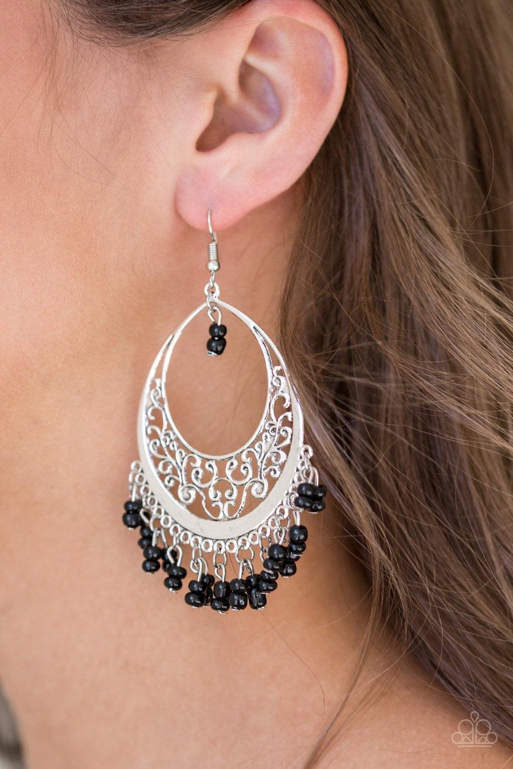 Paparazzi Accessories Malibu Mamba - Black Pairs of black seed beads swing from the bottom of a glistening silver teardrop radiating with filigree detail, creating a colorful fringe. Earring attaches to a standard fishhook fitting.Sold as one pair of earr