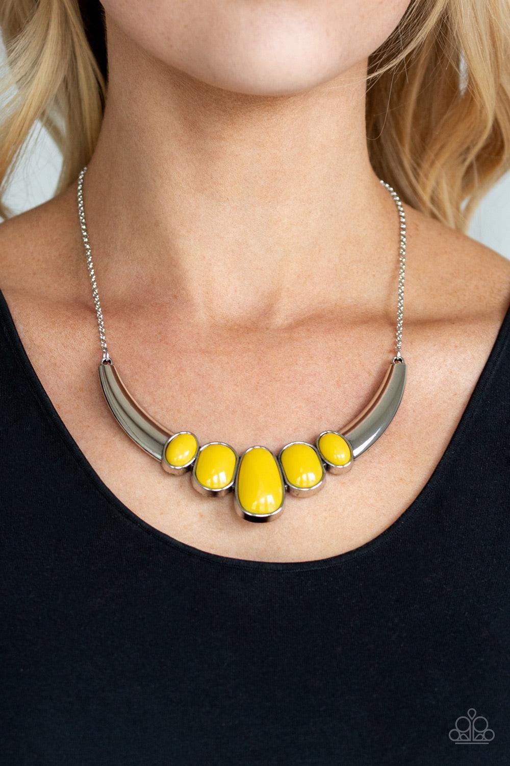 Paparazzi Accessories A BULL House - Yellow Gradually increasing in size at the center, a collection of abstract yellow beads are pressed into a shimmery half-moon frame, creating a colorful statement piece below the collar. Features an adjustable clasp c