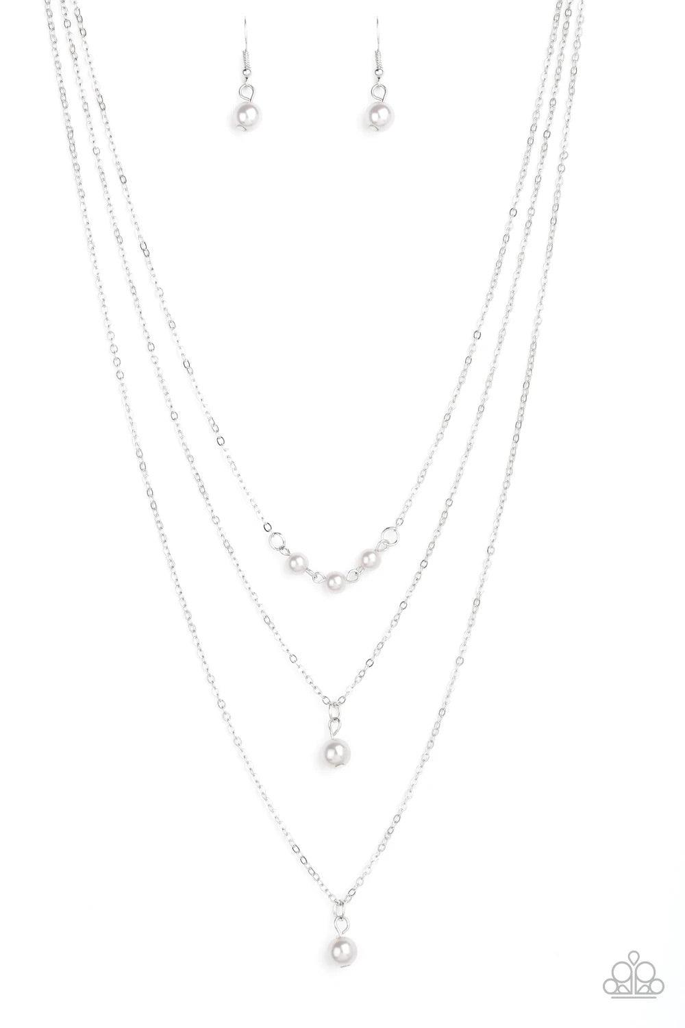 Paparazzi Accessories High Heels and Hustle - Silver A trio of pearly silver beads give way to layers of solitaire silver pearl pendants below the collar for a refined flair. Features an adjustable clasp closure. Jewelry