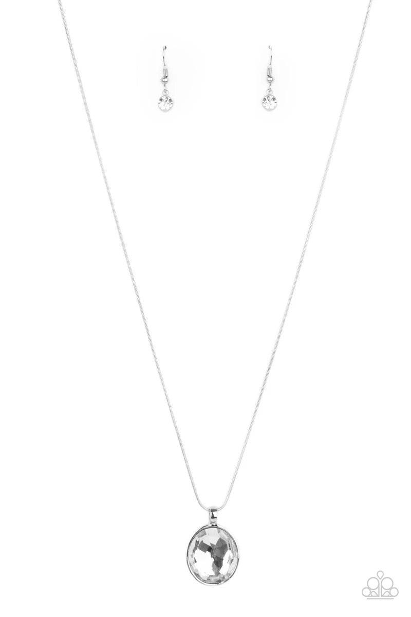 Paparazzi Accessories Instant Icon - White An oversized white gem is pressed into the center of a sleek silver fitting, creating a mesmerizing statement piece at the bottom of a sleek silver chain. Features an adjustable clasp closure. Sold as one individ