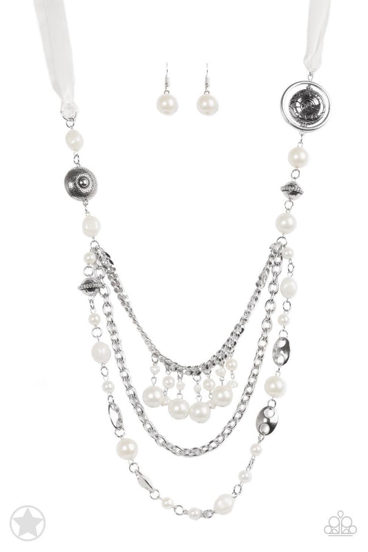 Paparazzi Accessories All The Trimmings - White A silky ivory ribbon replaces a traditional chain to create an elegant look. Pearly ivory beads and funky silver pieces intermix with varying lengths of silver chains to give a fresh take on a Victorian-insp