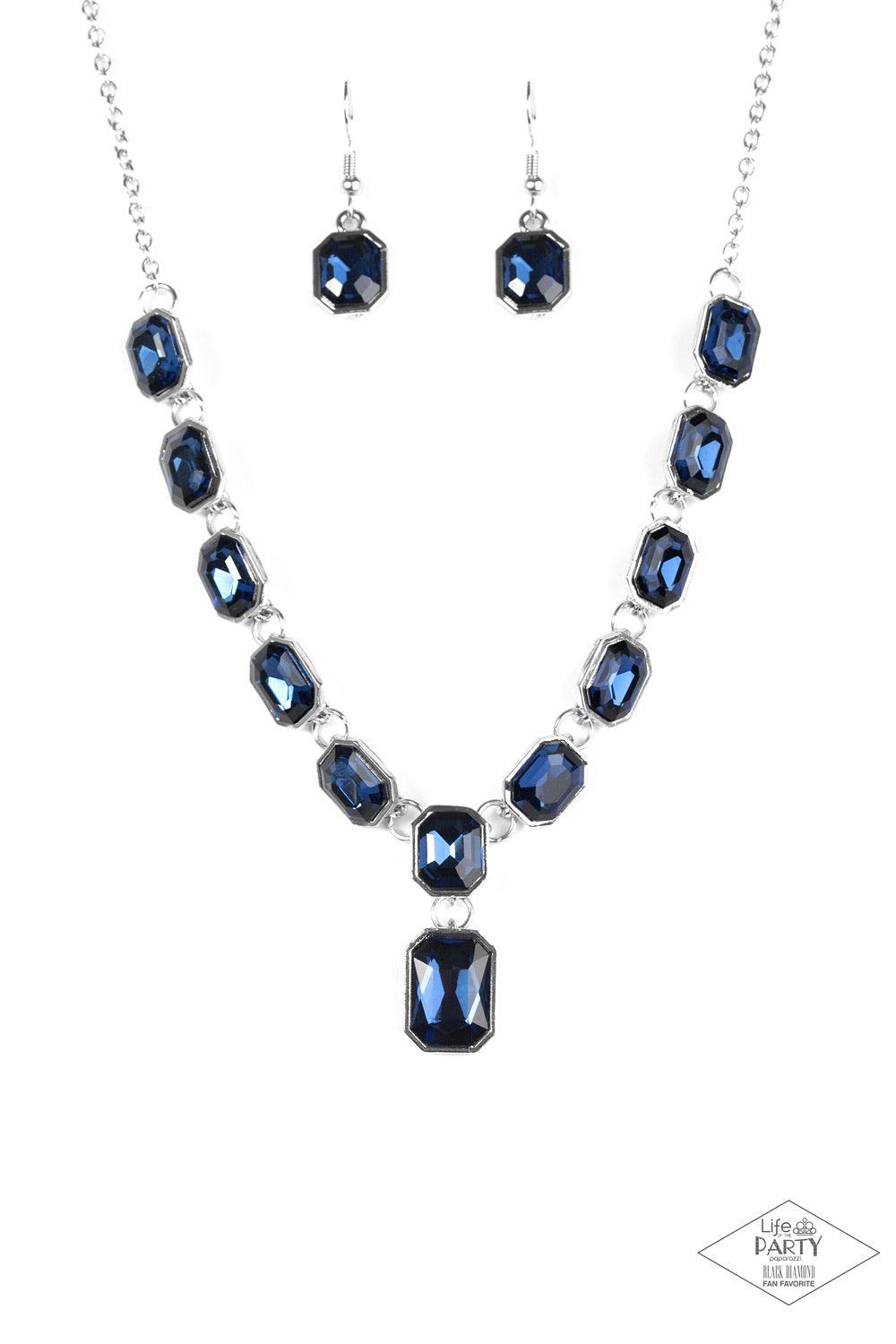Paparazzi Accessories The Right To Remain Sparkly - Blue Featuring regal emerald style cuts, glittery blue gems link below the collar in an undeniably sparkly fashion. A slightly larger blue gem swings from the center, creating an eye-catching pendant. Fe