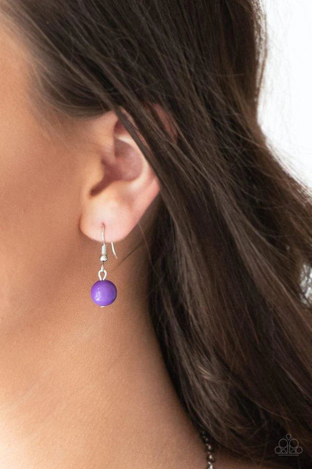 Paparazzi Accessories Vividly Vivid - Purple Polished purple, faceted crystal-like and delicately hammered silver hoops give way to mismatched silver chains down the chest for a whimsical look. Features an adjustable clasp closure. Sold as one individual