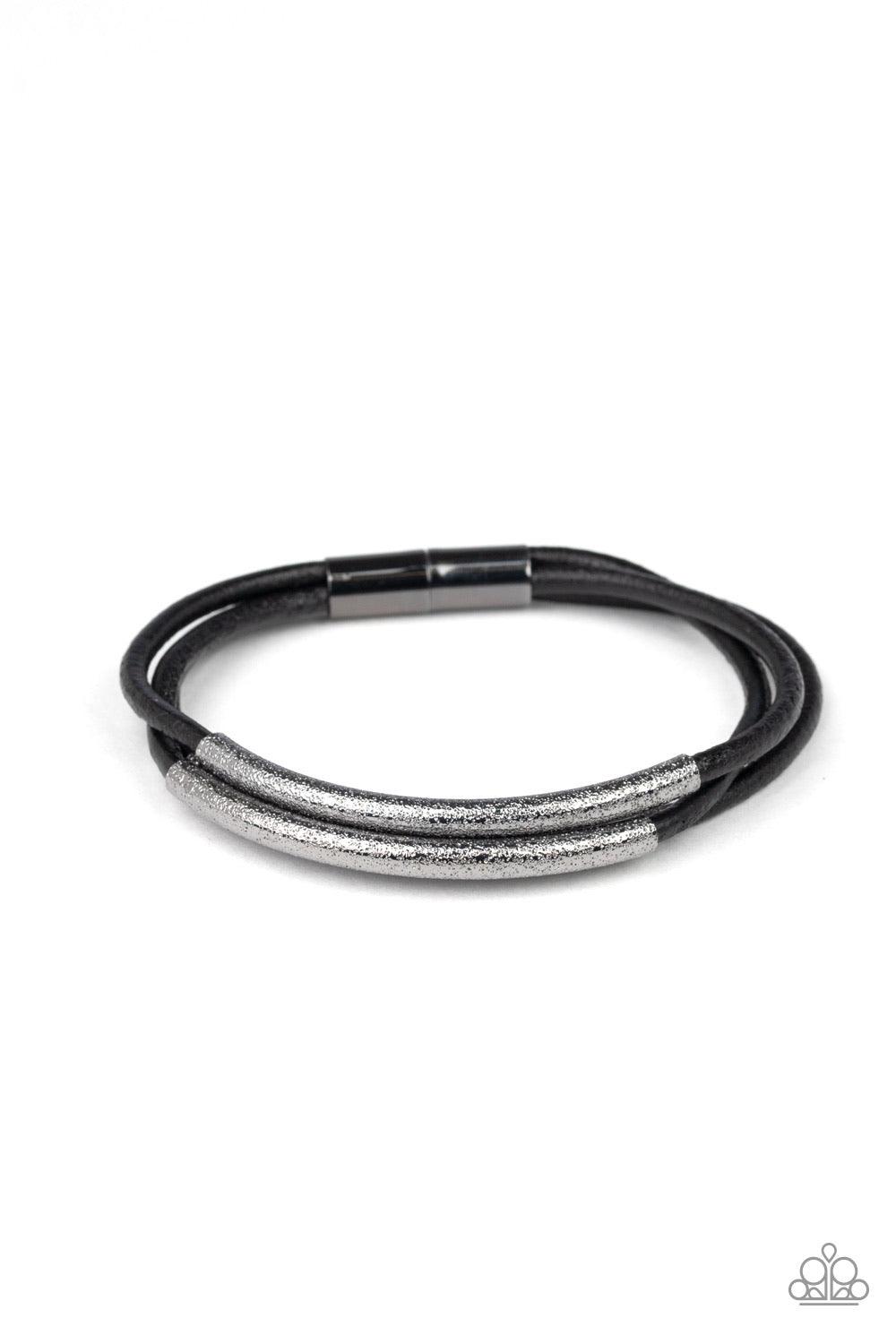 Paparazzi Accessories Magnetic Maverick - Black Hammered gunmetal accents are threaded along layers of black cording, creating an edgy centerpiece. Features a magnetic closure. Jewelry