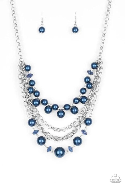 Paparazzi Accessories Rockin’ Rockette - Blue Varying in size, blue pearls, blue crystal-like beads, and faceted silver beads join with mismatched silver chains below the collar, creating a radically refined fringe. Features an adjustable clasp closure. S