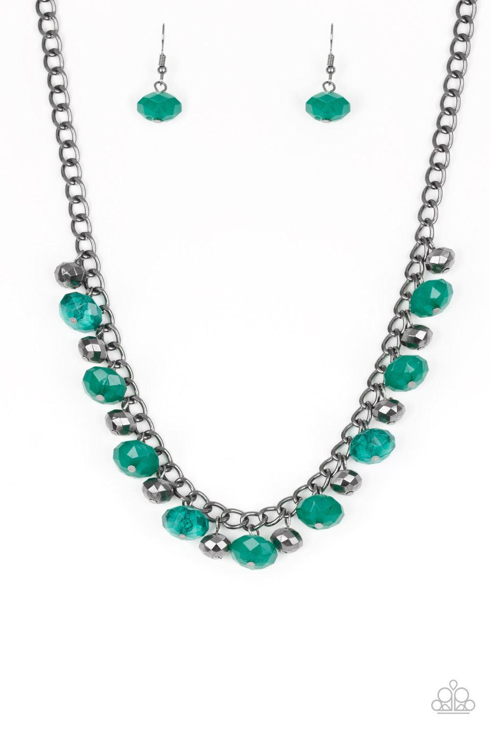Paparazzi Accessories Runway Rebel - Green Featuring cloudy and glassy finishes, faceted green crystal-like beads swing from the bottom a glistening gunmetal chain. Faceted gunmetal beads join the fiery beading, creating a flirtatious fringe below the col